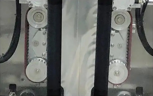 gusset pouch csomagológép részlet - Szinkronizált zsák húzó kerék